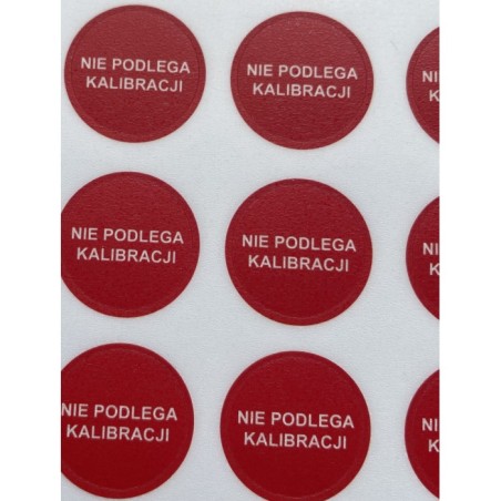 Etykiety: TYP-5, okrągłe Ø 20mm, czerwone, w środku napis: NIE PODLEGA KALIBRACJI, 35szt.